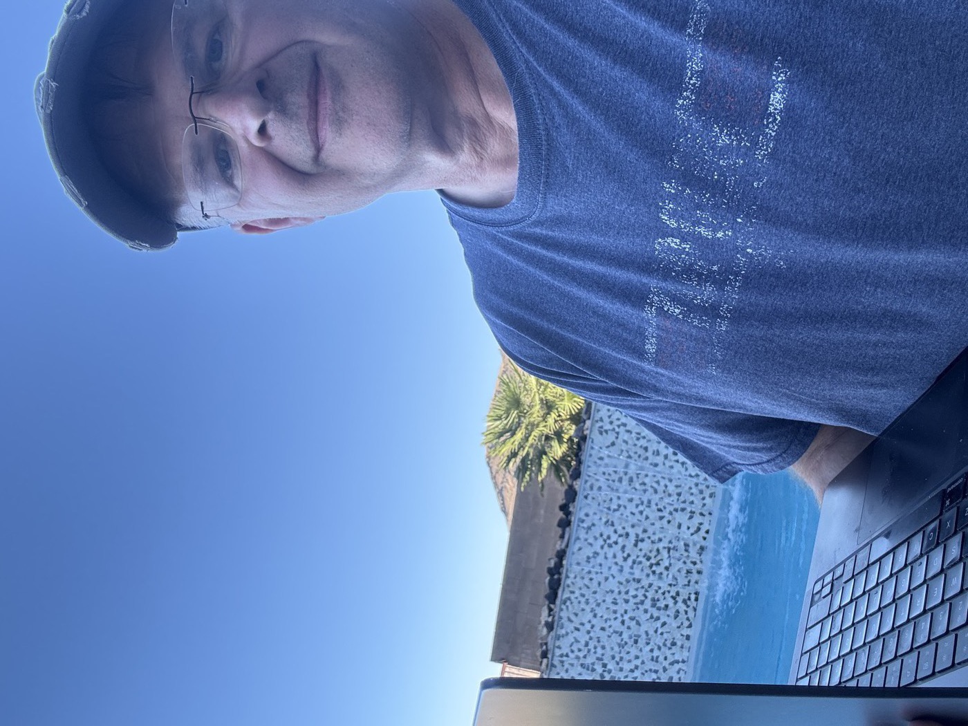 Mark Hale coding by his pool